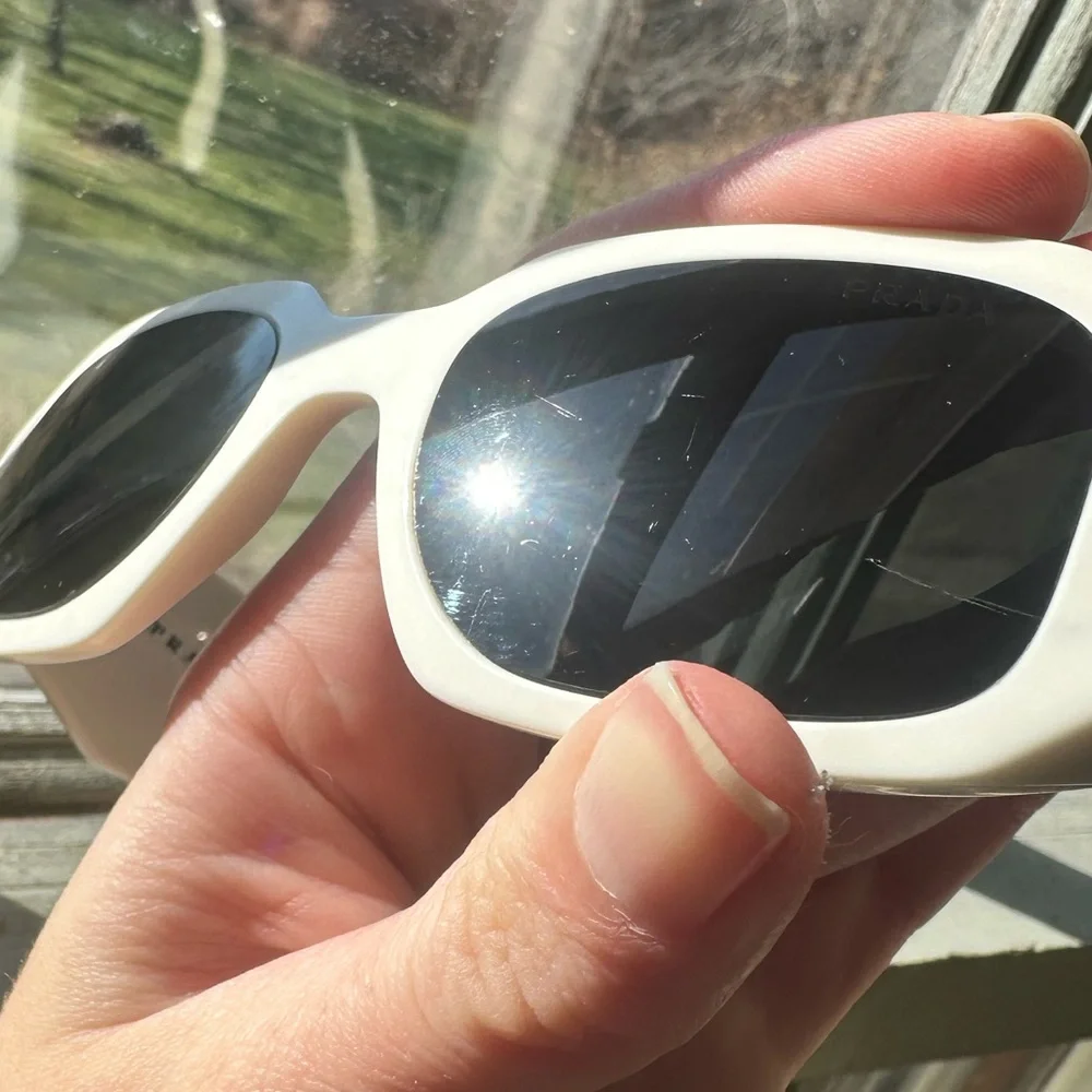 Prada White Frame Sunglasses with Dark Lenses